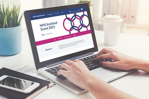 A person sitting at a laptop looking at the NHS Scotland Event site