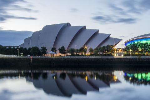 A landscape image of the SEC Armadillo building, on the banks of the Clyde River in Glasgow