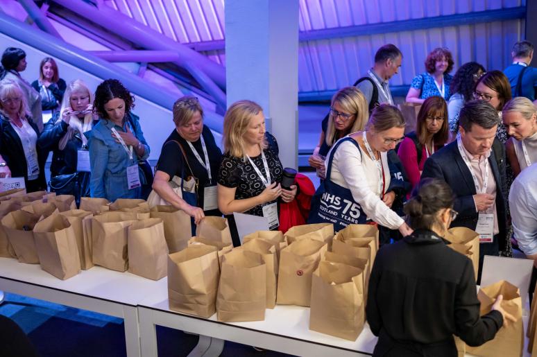 A table with brown paper bags